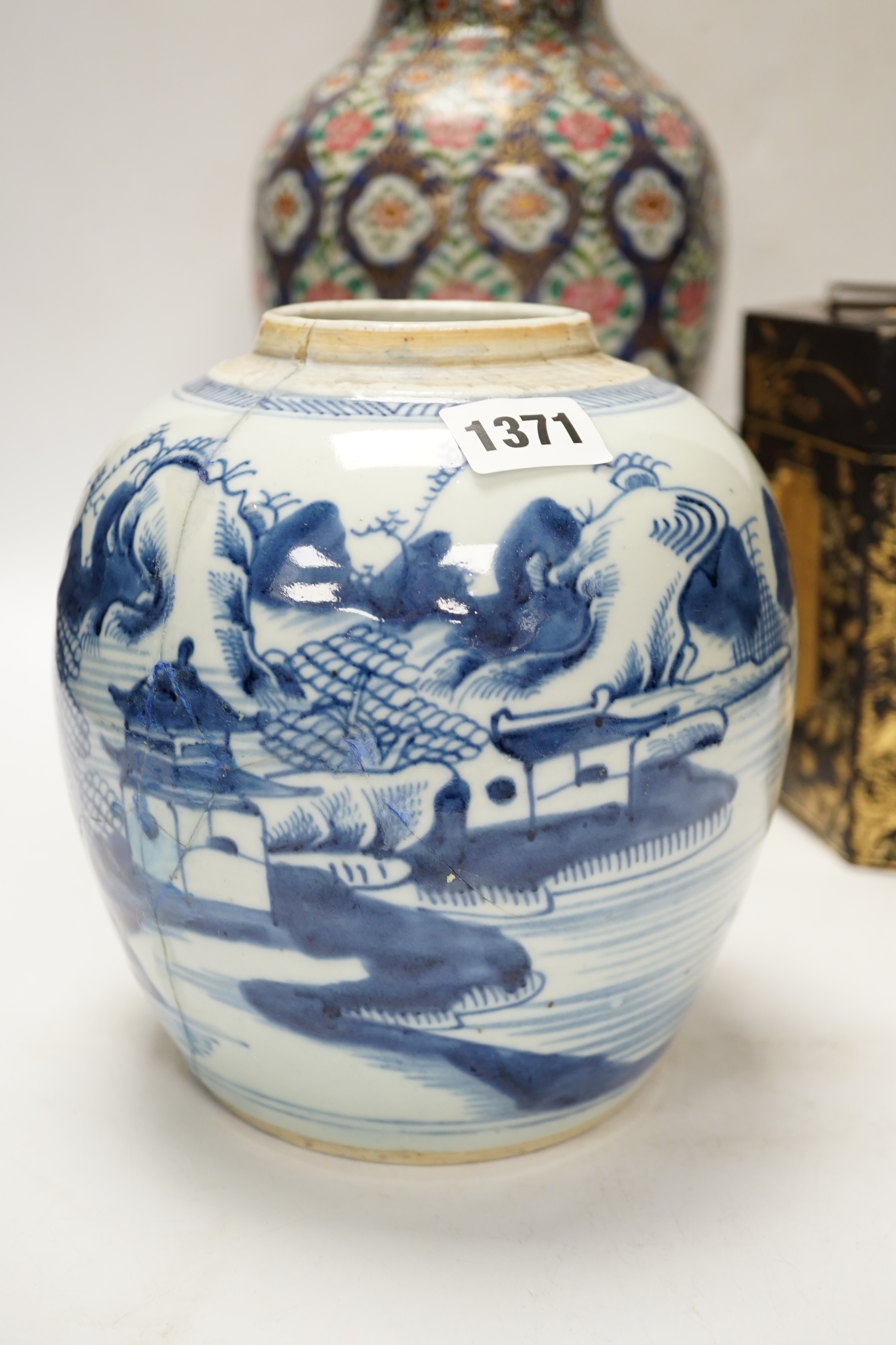 A group of Chinese items including a hardwood carving of luohan, an 18th century blue and white jar, a lacquer box, etc.